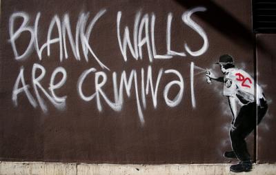 grafitti 'blank walls are criminal' in Fitzroy, Australia