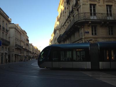 Tram cutting through the heart of historical Bordeaux