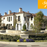 Exterior view of the Palladian-style townhomes at the SoSeven mixed-use development in Fort Worth, Texas.  The Townhomes at SoSeven are 59 luxury townhomes arrayed around a central roundabout & fountain in the southernmost part of the site.