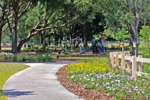 View from the walking trail showing the Brytan Butterfly Garden and brand-new playground, called Carl's Corner