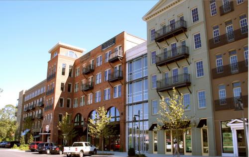 This projects includes a vertically mixed-use core closest to the city's historic commercial blocks, which features a town square, civic buildings, retail, office and multi-family units. 