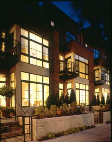 In this project, a new townhouse development is built in a historic warehouse quarter located near downtown Portland, Oregon.  These townhouses were designed to complement the scale and texture of the neighborhood’s industrial character, and provide a strong street-level presence creating a sense of community and safety.